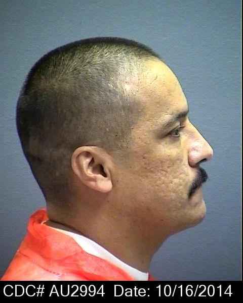 Side mugshot image of Art Juan Castaneda
