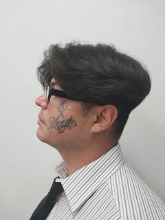 Side mugshot image of Andrew David Valdez
