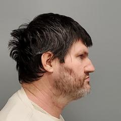 Side mugshot image of Jason  Oakland