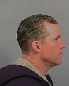 Side mugshot image of Thomas Oscar Ray