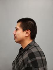 Side mugshot image of Ivan David Campos