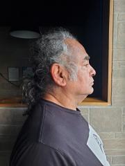 Side mugshot image of Rony  Folgar