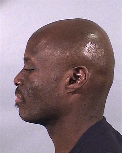 Side mugshot image of Michael Anthony Clark