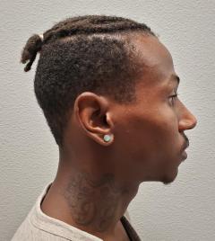 Side mugshot image of Jazmion Latique Carter