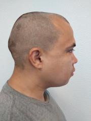 Side mugshot image of Alex Isaiah Garcia