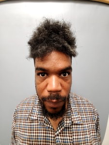 Front mugshot image of Kennen Gregory Moore