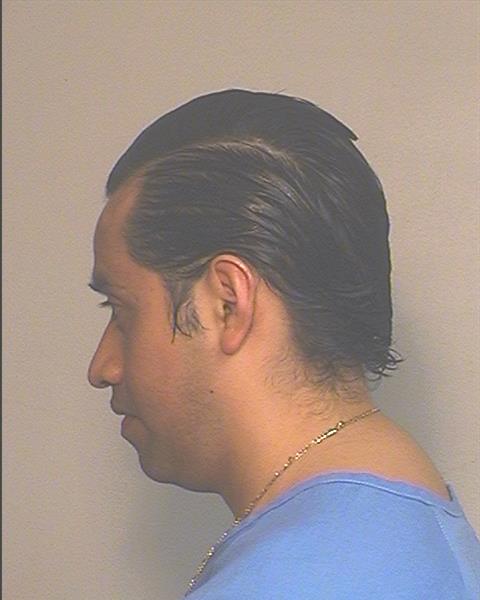 Side mugshot image of Edgar  Perez