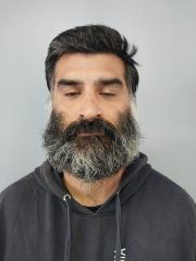 Front mugshot image of Renato  Rashidally