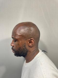 Side mugshot image of Marlon Monte Brewer