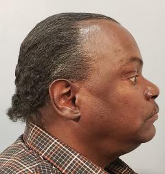 Side mugshot image of Rene Michael Brown