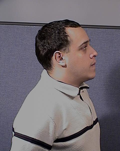 Side mugshot image of Aaron D Castro