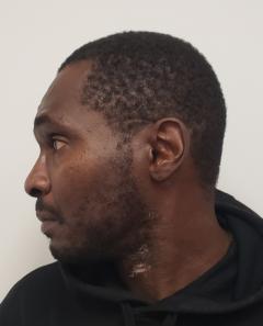 Side mugshot image of Anthony Touche Paxton
