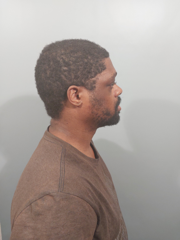 Side mugshot image of Dallas Brandon Thomas