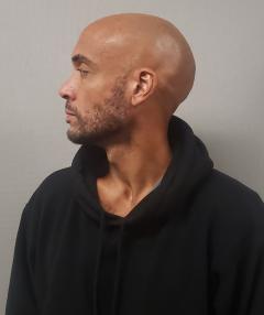 Side mugshot image of Andrew David Bruins