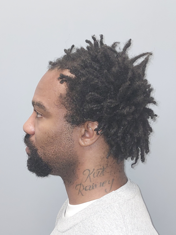 Side mugshot image of Danzel  Rainey