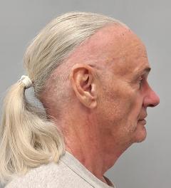 Side mugshot image of Daniel Lee Gibson