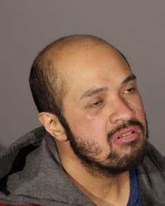 Side mugshot image of Datu Mohammad Kiram