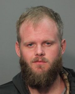 Front mugshot image of Christopher Ryan Hus