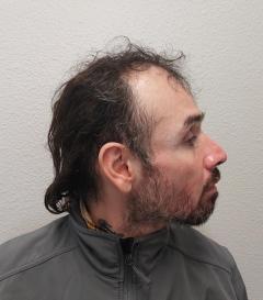 Side mugshot image of Manuel Alejandro Medina