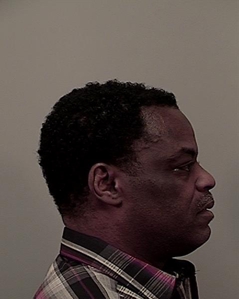 Side mugshot image of Kevin Pierre Coe