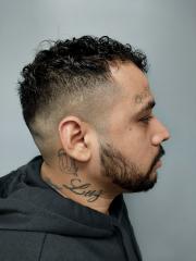 Side mugshot image of Genaro  Posadaz