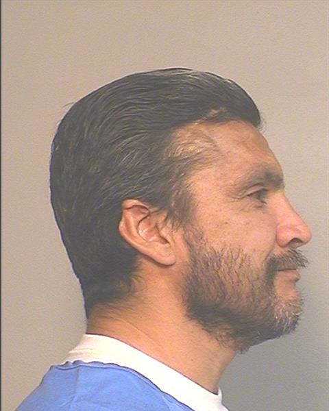 Side mugshot image of Baudelio Fernando Vela