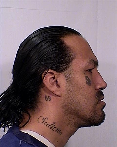 Side mugshot image of Philip Miguel Gomez