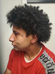 Side mugshot image of Travante  Mennuti