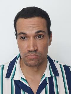 Front mugshot image of Brandon Robert Mendes