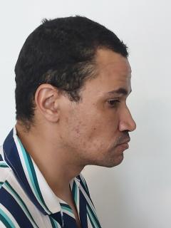 Side mugshot image of Brandon Robert Mendes