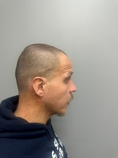 Side mugshot image of Terry Lynn Baker