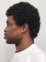 Side mugshot image of Clarence Andrae Simpson