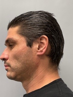 Side mugshot image of Victor Matthew Taylor