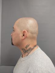 Side mugshot image of Robert Jake Freitas