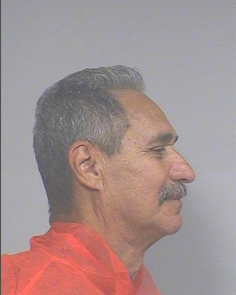 Side mugshot image of Rudy Charles Hernandez