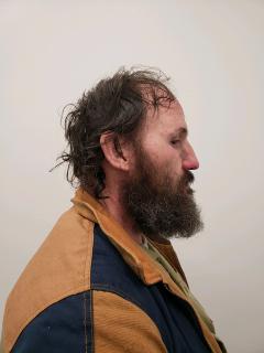 Side mugshot image of Harvey  Eustis