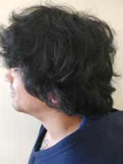 Side mugshot image of Alvaro Norberto Carabantes