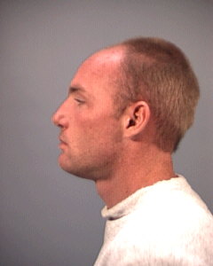 Side mugshot image of Richard Eugene Menken