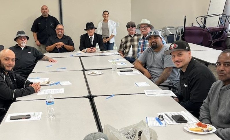 Parole Agent II Specialist (Community Reentry Unit) and Hanford Parole Agent Brian Camarillo with PRNN participants.