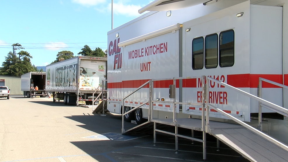 A white trailer with the words "CAL FIRE Mobile Kitchen Unit"