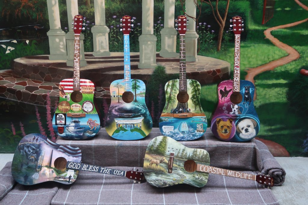 Brightly painted guitars
