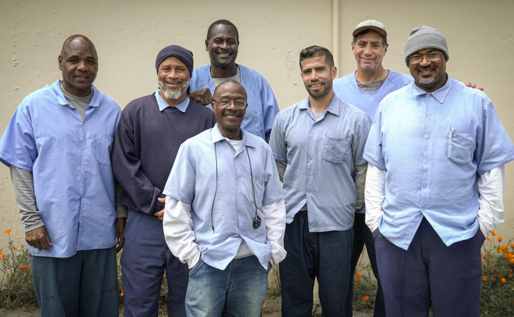7 KALW incarcerated speakers pose for photo