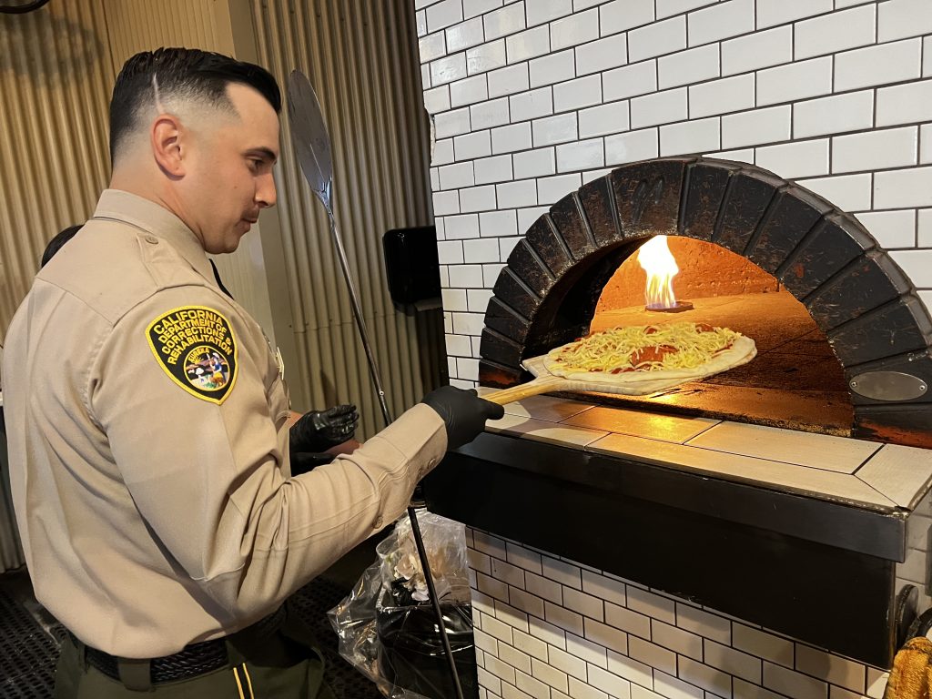 PBSP peace officer making pizza