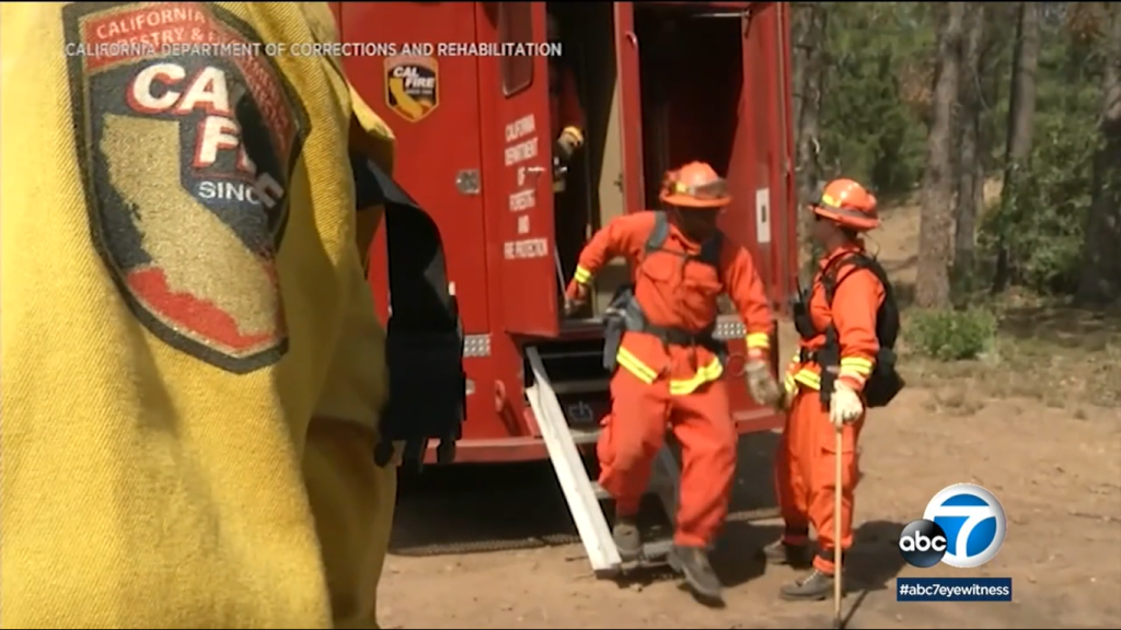 firefighters leaving a crew carrying vehicle