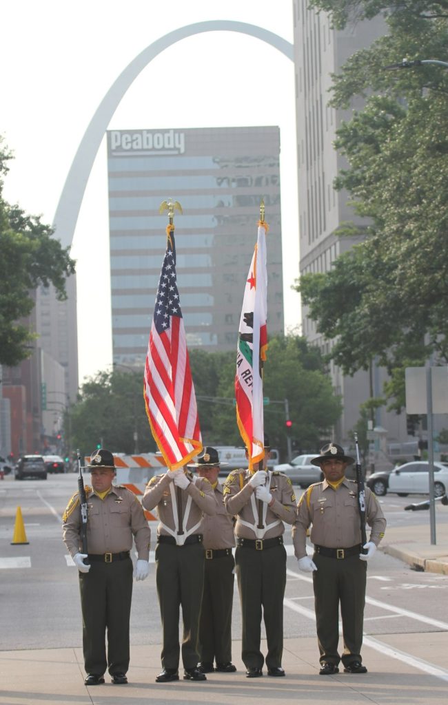 MCSP honor guard holding CA flag and American flag