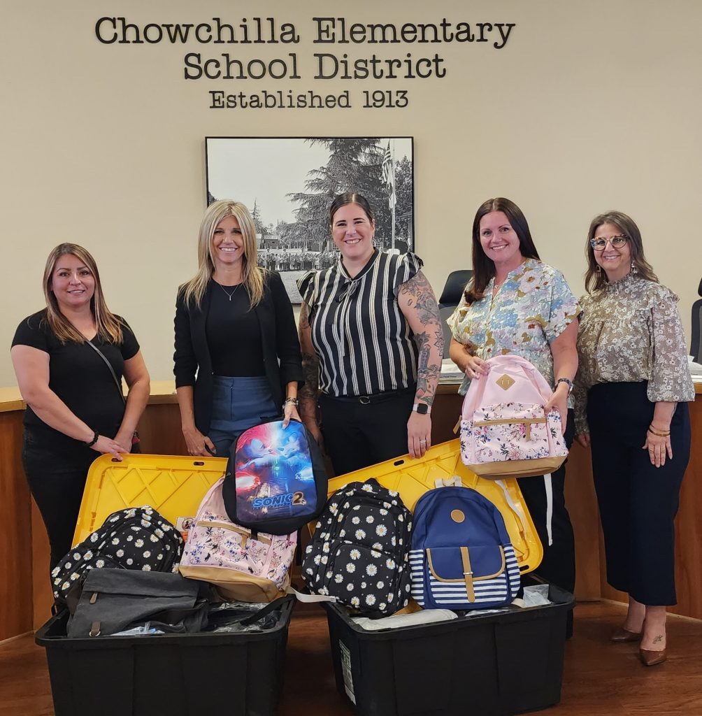 CCWF staff dropping backpacks off at school districts