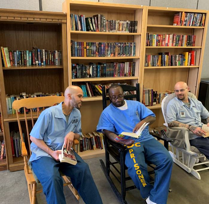 incarcerated reading books together at CMF