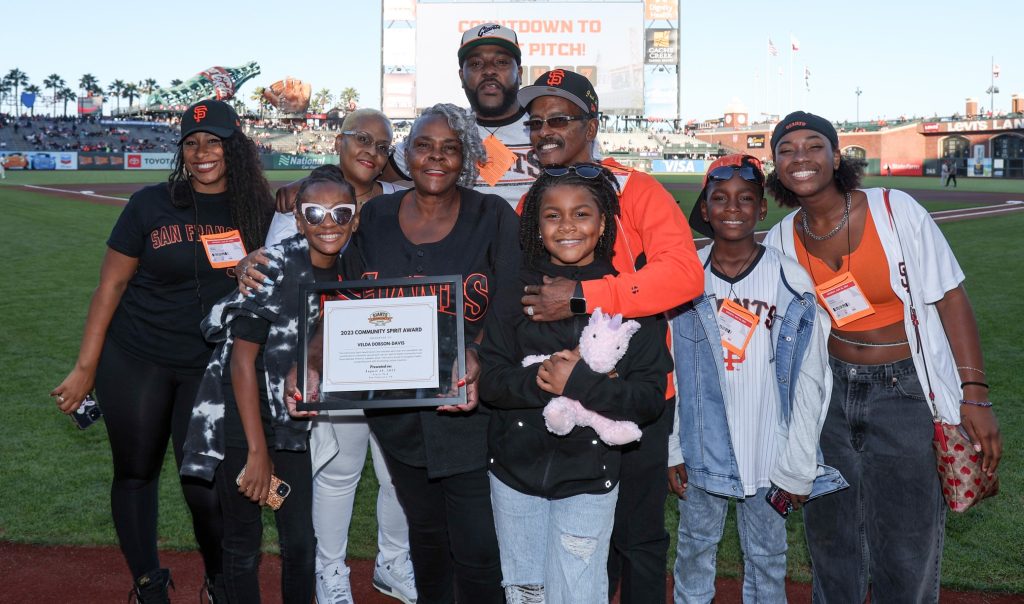 Dobson Davis with family at SF Giants game receiving award