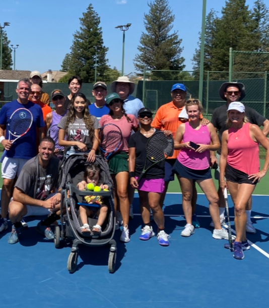 KVSP staff and family at tennis court for fundraiser
