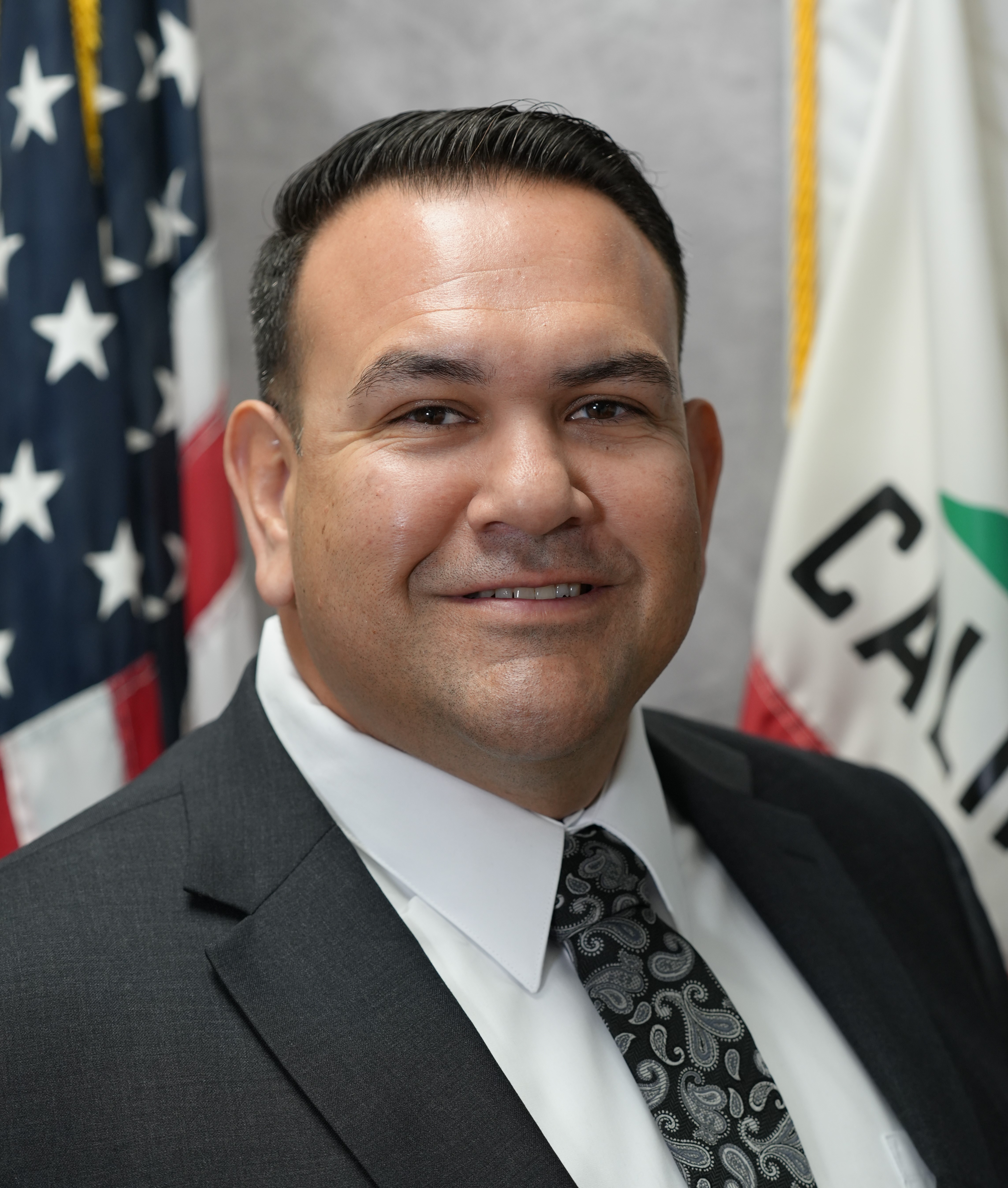Portrait of acting Warden Ernesto Bustamante